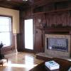This Study was done in Black Walnut. The inset doors above the fireplace mantel hide a small plasma TV. ( Note: The finish on this job was done by the clients painting contractor and not CCS.)